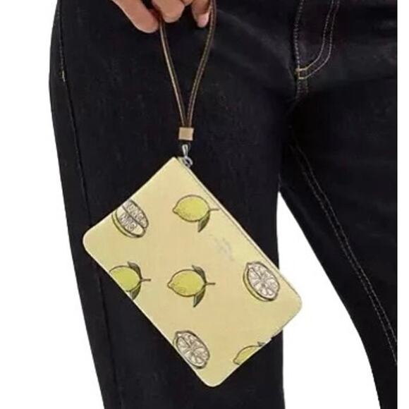 Coach lemon wristlet - Picture 1 of 2